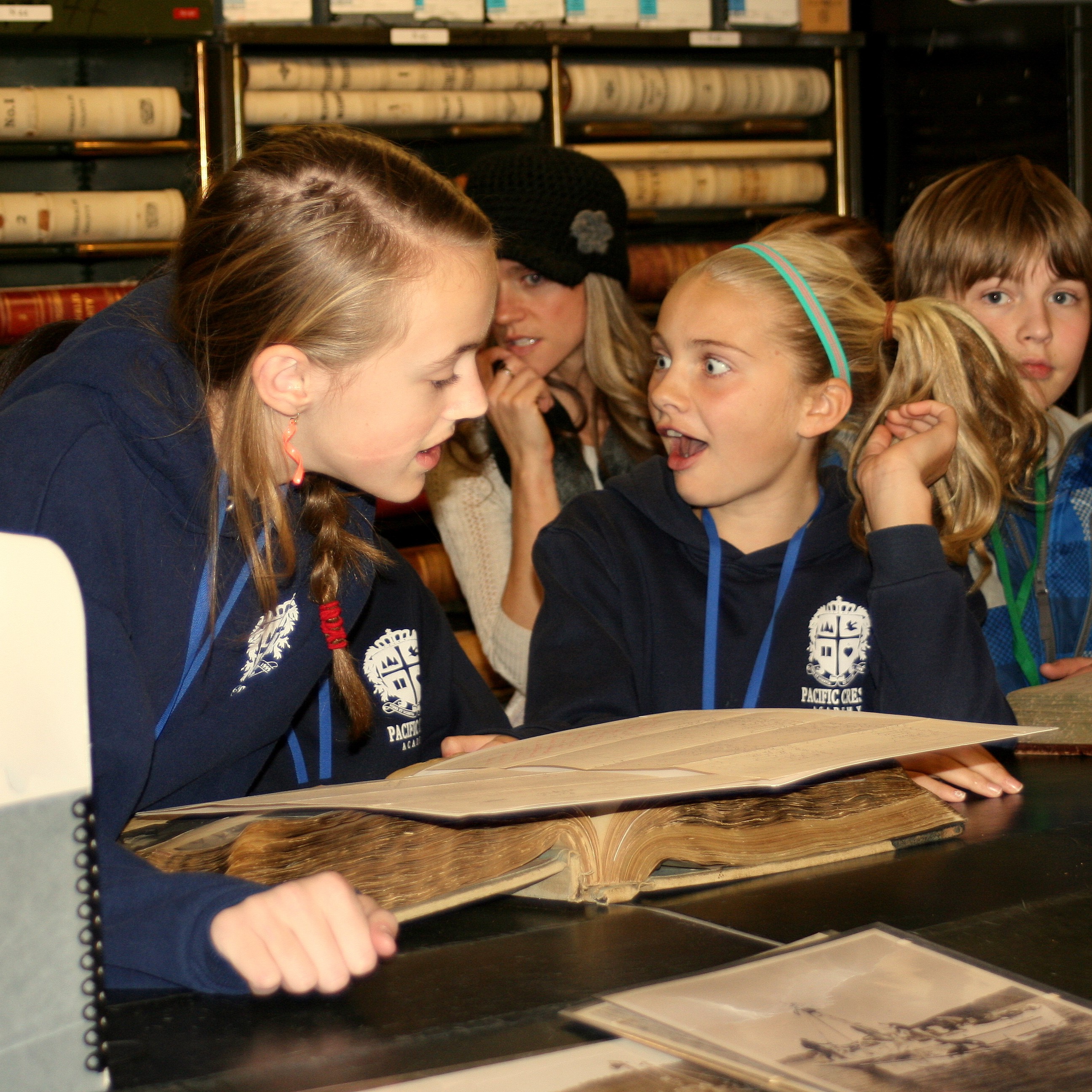 Students looking at archival texts.